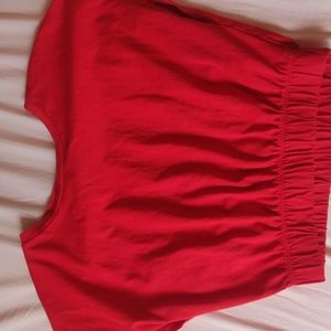 Red sleeveless top